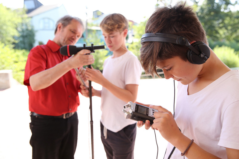 Waldorf students learn how to use radio technology from their teacher