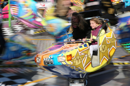 A girl and her mentor on a roller coaster