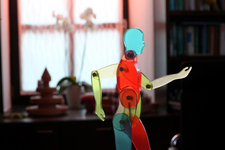 Human sculpture on desk in doctor's room