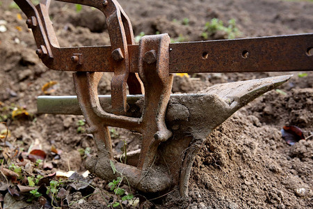 An old plough and soil