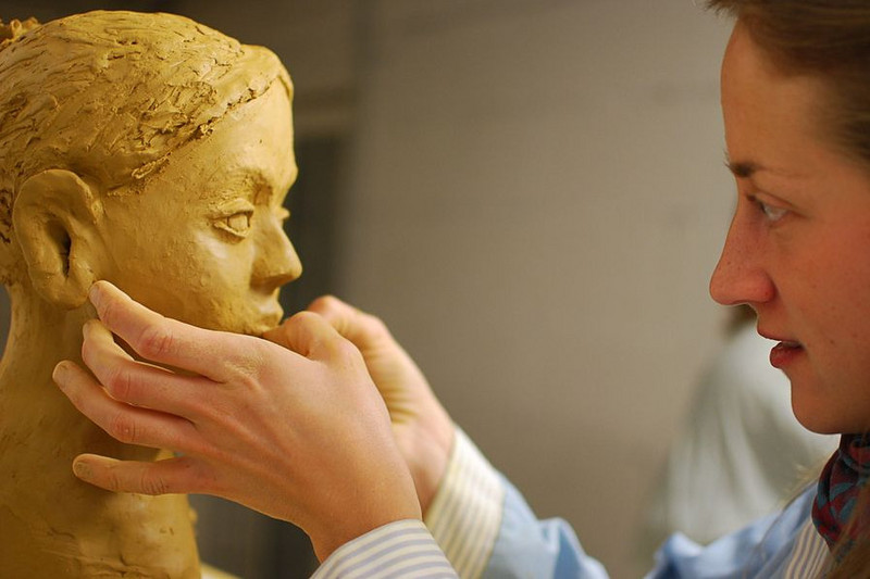 Young female Doctor sculpting