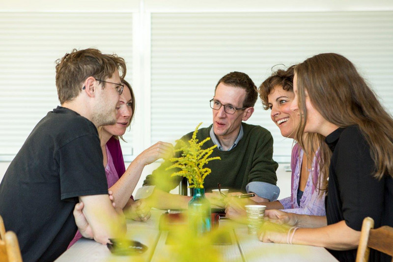 Post-Graduate Students in conversation