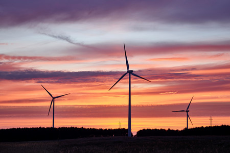 Wind turbines at sunset