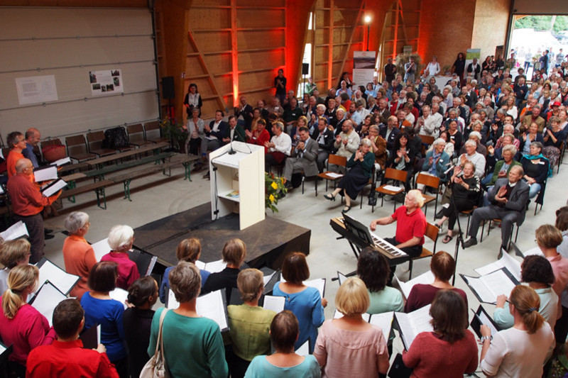 Choir and audience celebrating the anniversary